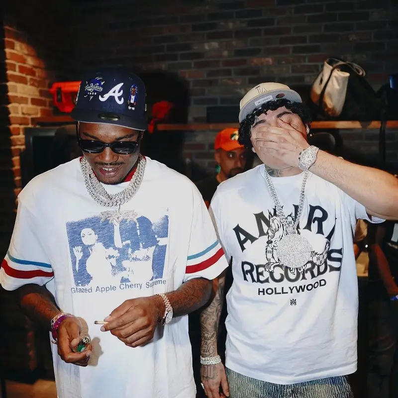 OhGeesy outfit in Amiri and New Era, 2023