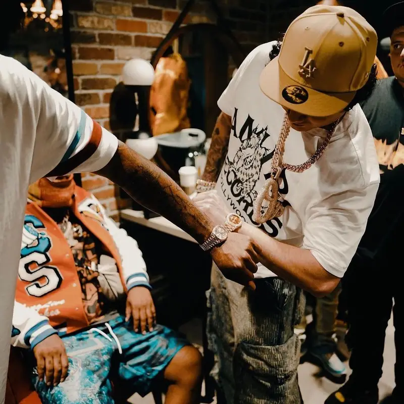 OhGeesy outfit in Amiri and New Era, 2023
