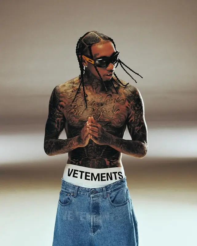 Tyga outfit in Vetements, Timberland, and Bottega Veneta, 2023