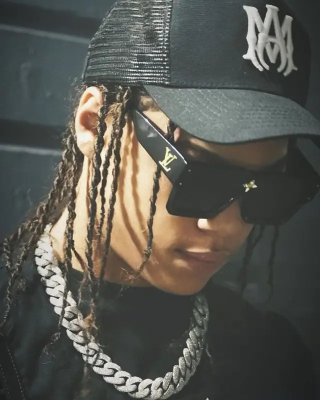 SugarHill Ddot outfit in Goyard, Louis Vuitton, and Amiri, 2023