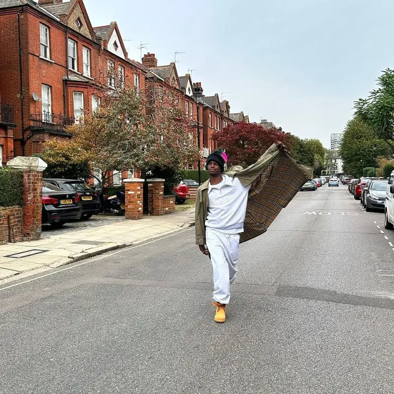 ASAP Nast outfit in Burberry, Places + Faces, and Beats by Dre, 2023