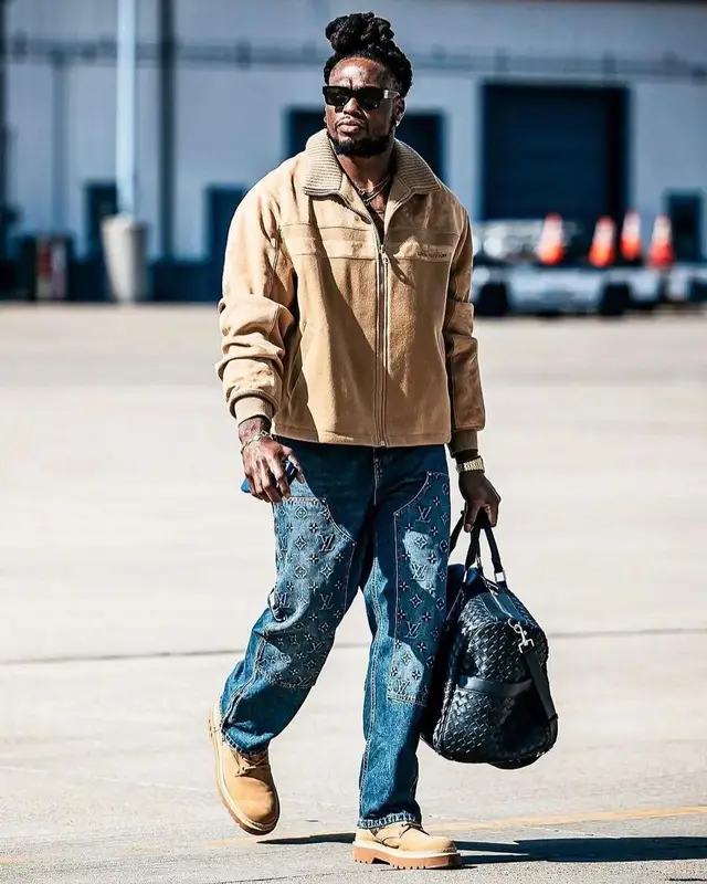 Derrick Henry outfit in Bottega Veneta and Louis Vuitton, 2023