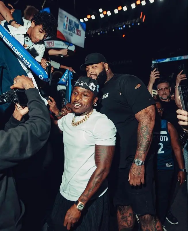 DaBaby outfit in Denim Tears and Team Us Sports Club, 2023