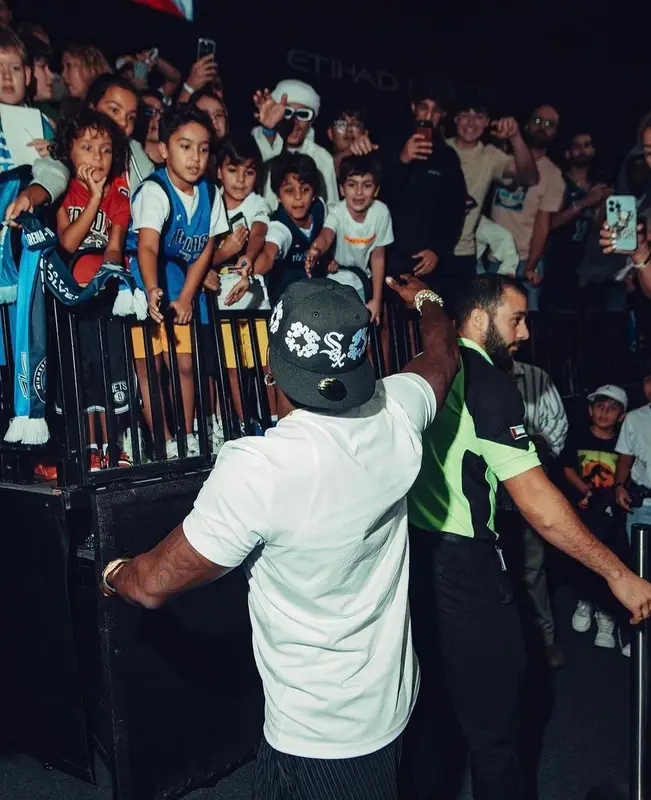 DaBaby outfit in Denim Tears and Team Us Sports Club, 2023