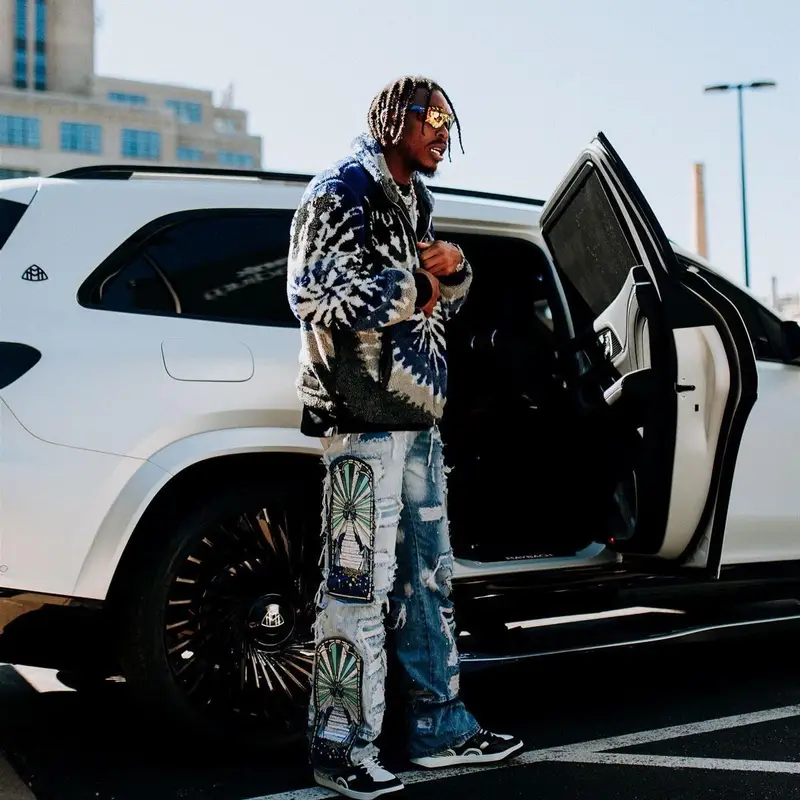 Justin Jefferson outfit in Amiri, Who Decides War, and Gucci, 2023