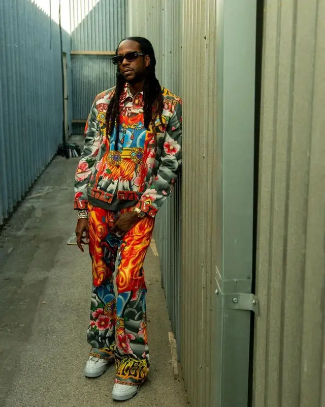 2 Chainz outfit in Cout De La Liberte, Louis Vuitton, and Valentino, 2023