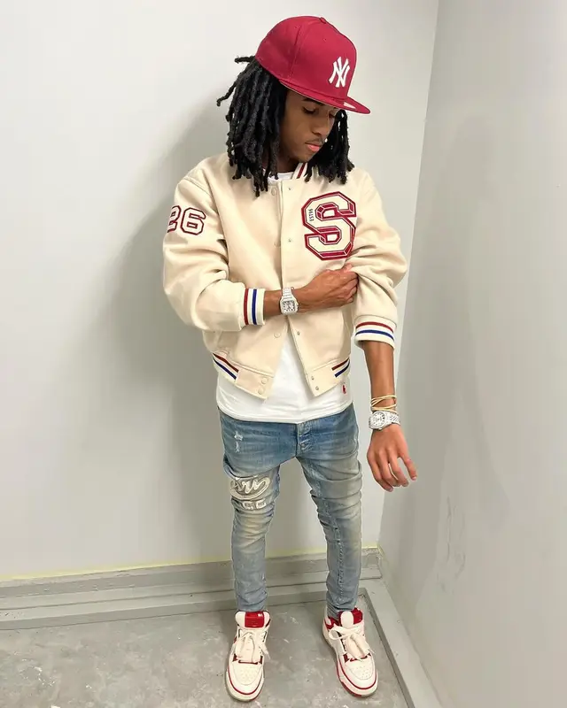 Lil Darius outfit in H&M, Polo Ralph Lauren, and New Era, 2023