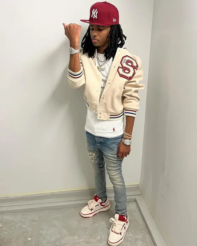 Lil Darius outfit in H&M, Polo Ralph Lauren, and New Era, 2023