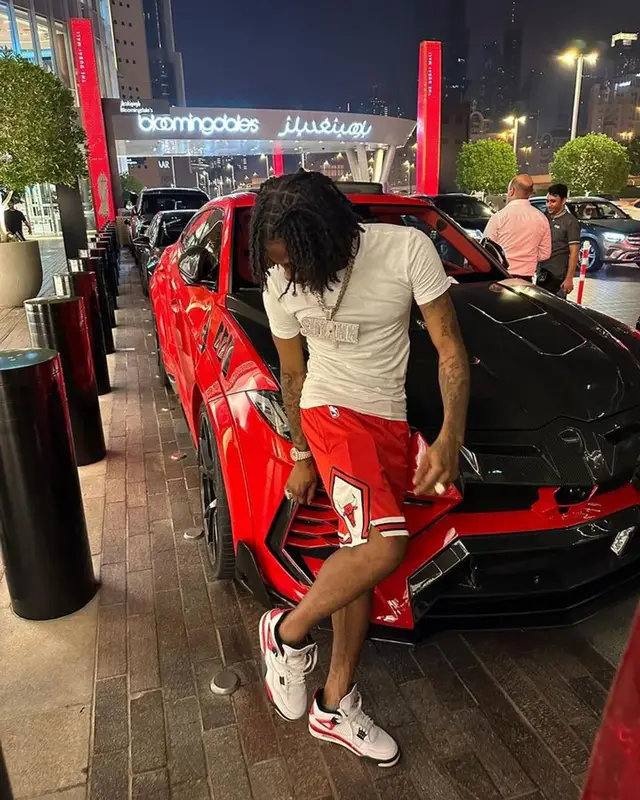 Russ Millions outfit in Hanes, Nike, and Jordan, 2023