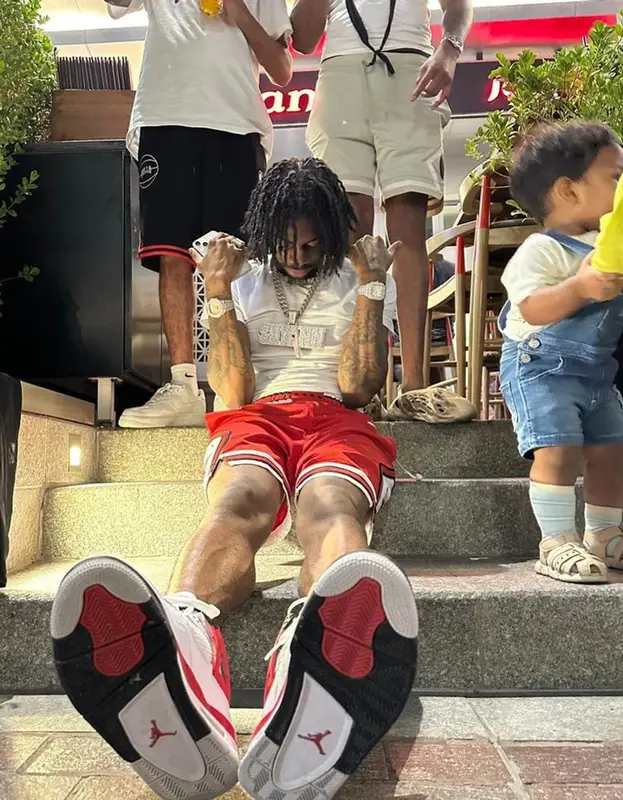 Russ Millions outfit in Hanes, Nike, and Jordan, 2023