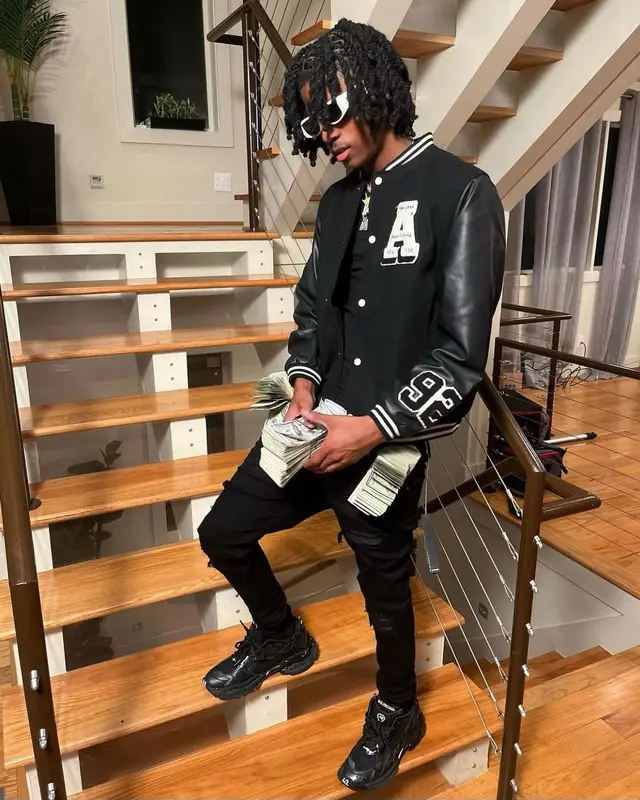 Lil Darius outfit in H&M, Amiri, and Balenciaga, 2023