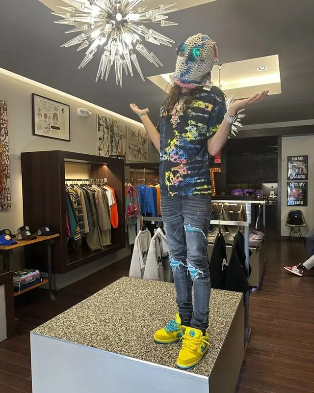 BabyTron outfit in Louis Vuitton, Amiri, and Nike, 2023