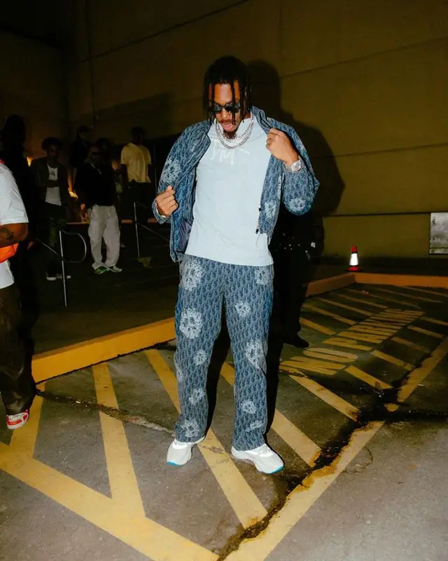 Justin Jefferson outfit in Dior, Louis Vuitton, and Denim Tears, 2023
