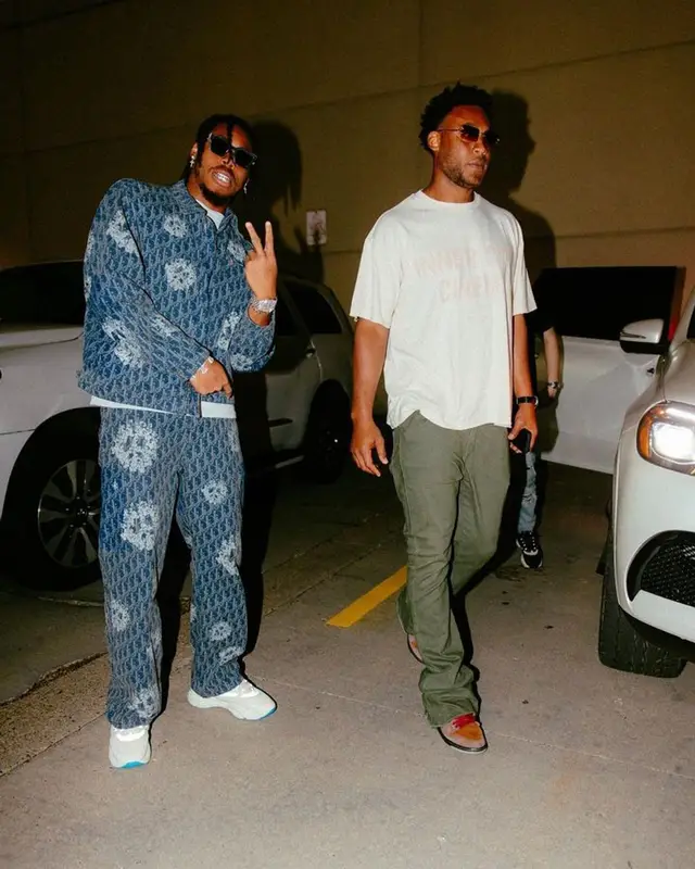 Justin Jefferson outfit in Dior, Louis Vuitton, and Denim Tears, 2023