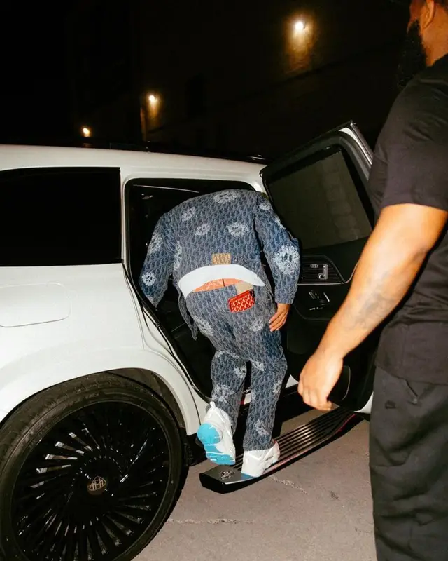 Justin Jefferson outfit in Dior, Louis Vuitton, and Denim Tears, 2023