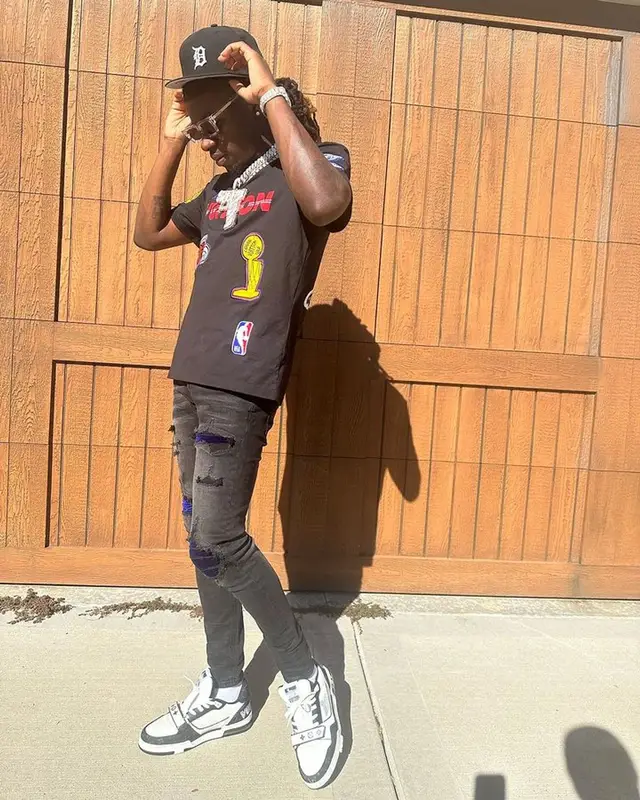 SleazyWorld Go outfit in Louis Vuitton, Saint Laurent, and New Era, 2023