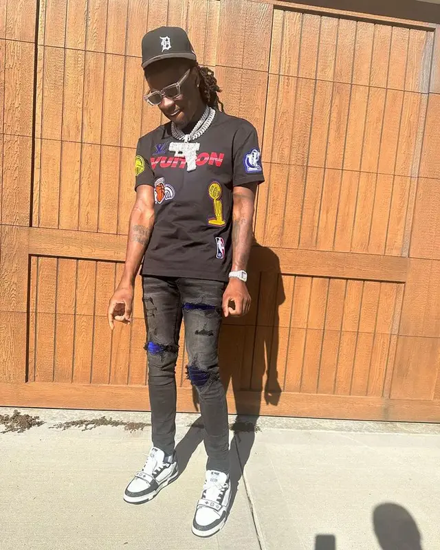 SleazyWorld Go outfit in Louis Vuitton, Saint Laurent, and New Era, 2023