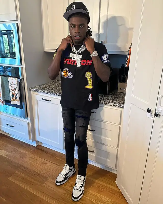SleazyWorld Go outfit in Louis Vuitton, Saint Laurent, and New Era, 2023