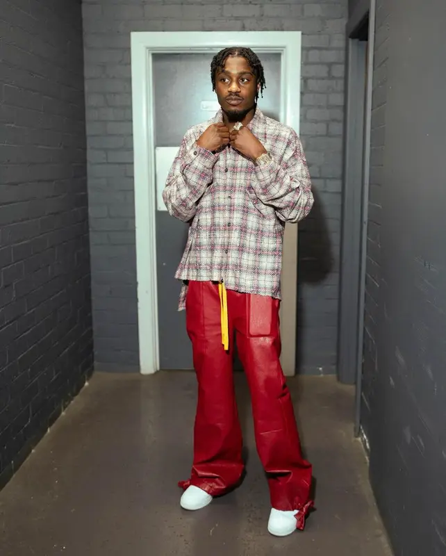 Lil Tjay outfit in Faith Connexion, Whensmokeclears, and Nike, 2023