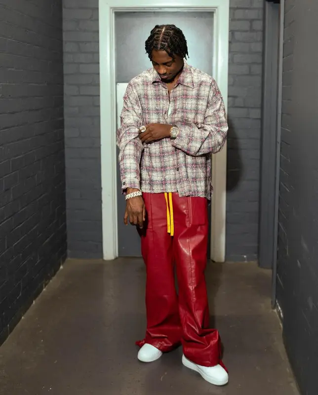 Lil Tjay outfit in Faith Connexion, Whensmokeclears, and Nike, 2023