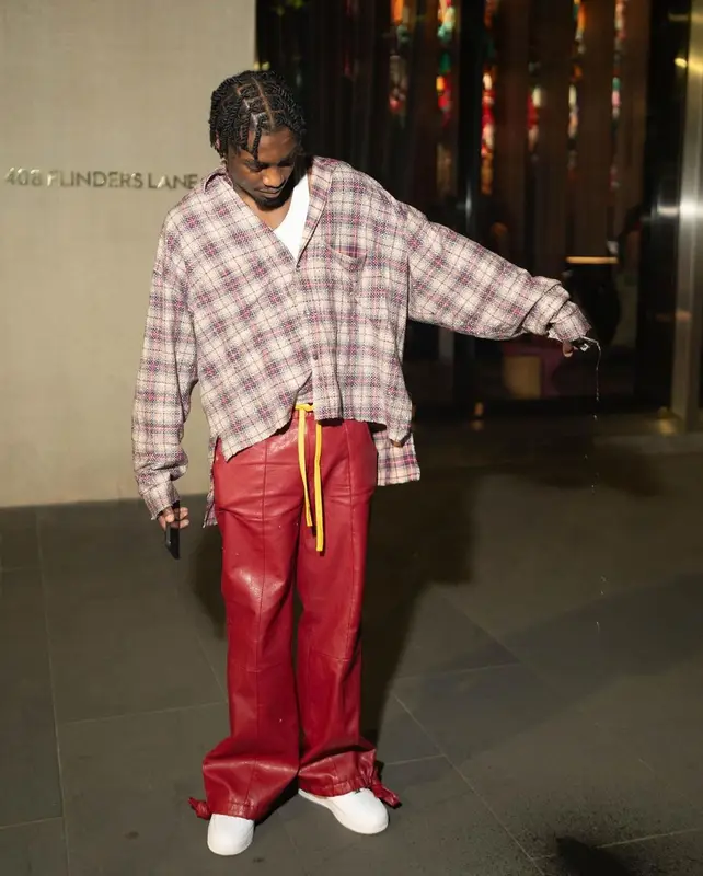 Lil Tjay outfit in Faith Connexion, Whensmokeclears, and Nike, 2023