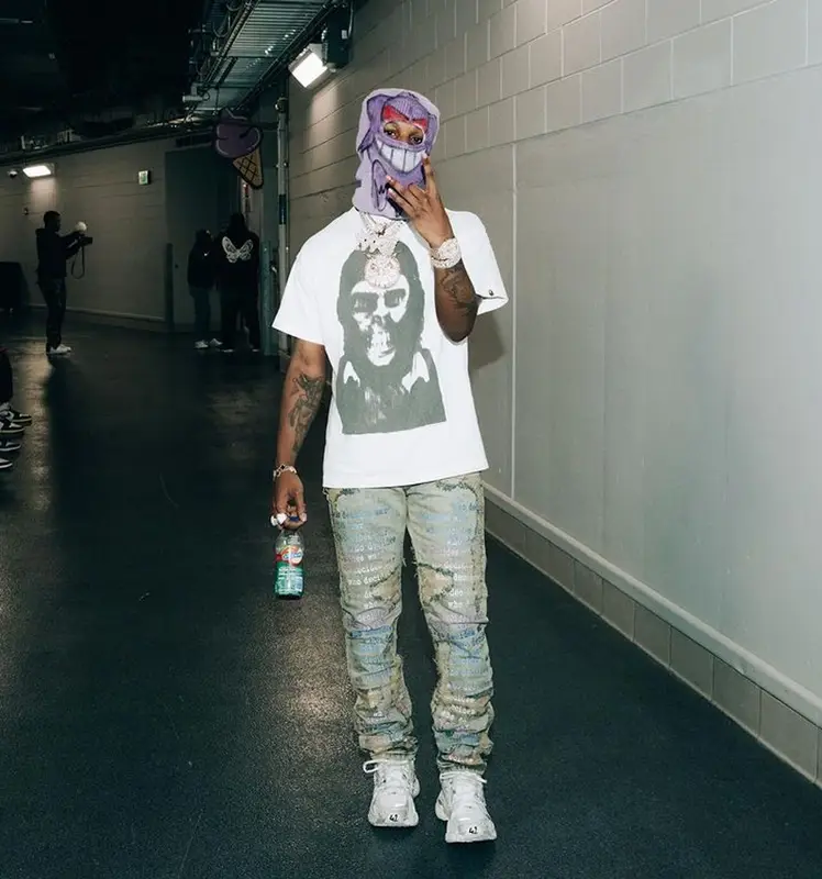 Toosii outfit in Bape, Who Decides War, and Balenciaga, 2023