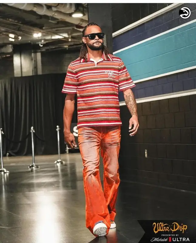 Patty Mills outfit in Dior, Cout De La Liberte, and Denim Tears, 2023