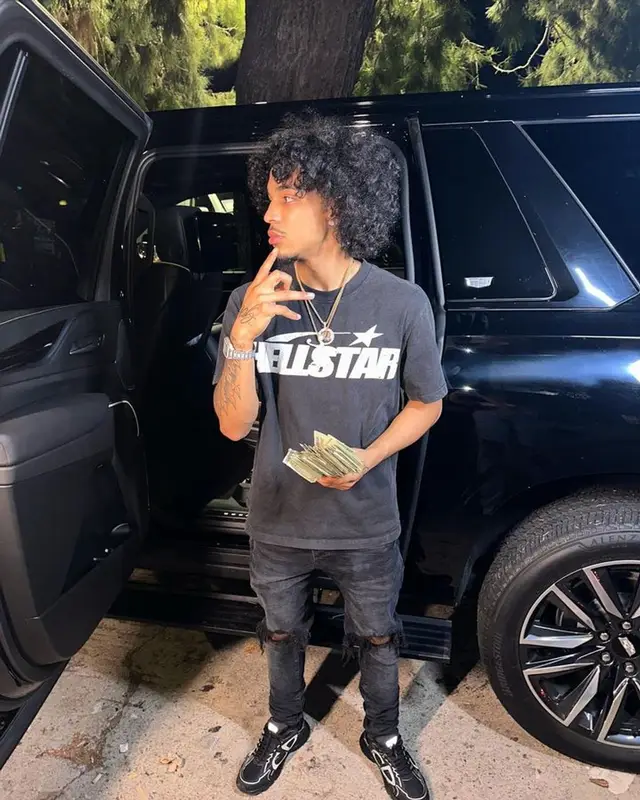 Jay Cinco outfit in Hellstar, Purple Brand, and Dior, 2023