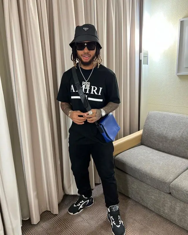 Poco Lee outfit in Amiri, Louis Vuitton, and Prada, 2023