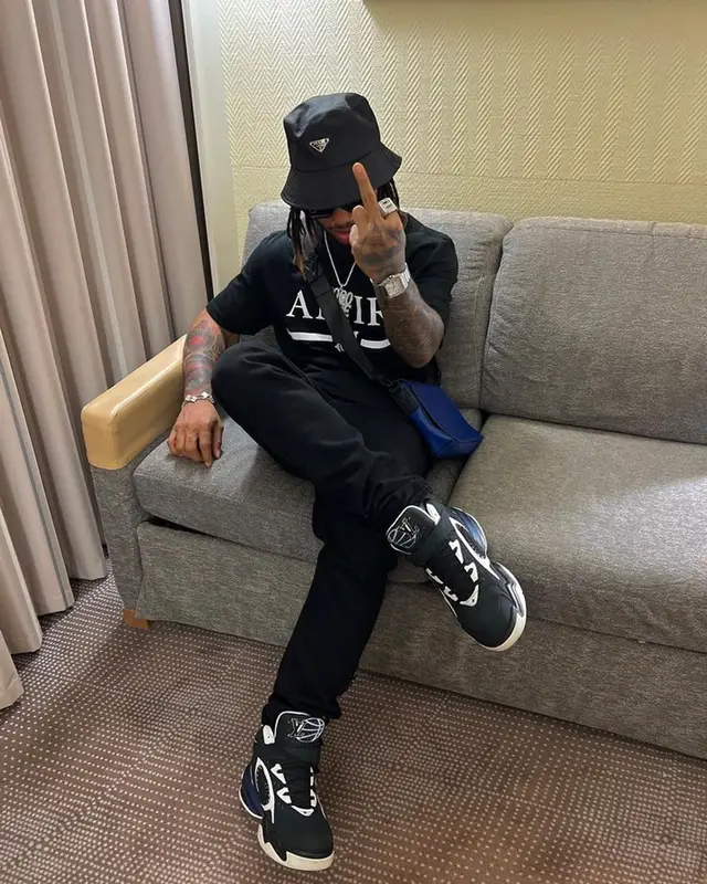 Poco Lee outfit in Amiri, Louis Vuitton, and Prada, 2023