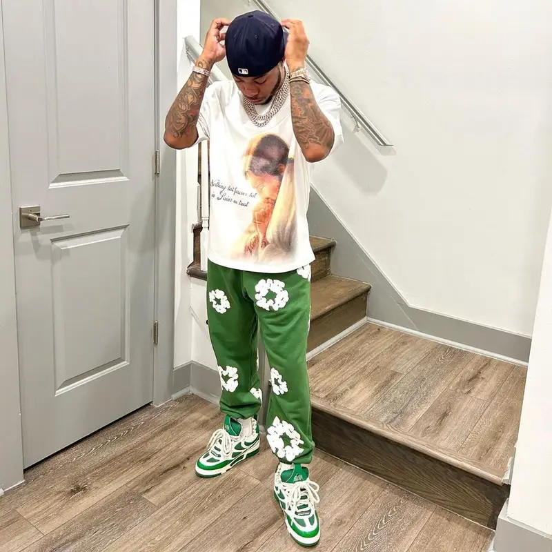 Chino Braxton outfit in Denim Tears, Louis Vuitton, and Gallery Dept., 2023