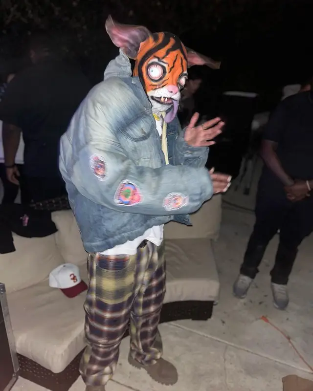Chris Brown outfit in Saint Michael, Givenchy, and Balenciaga, 2023
