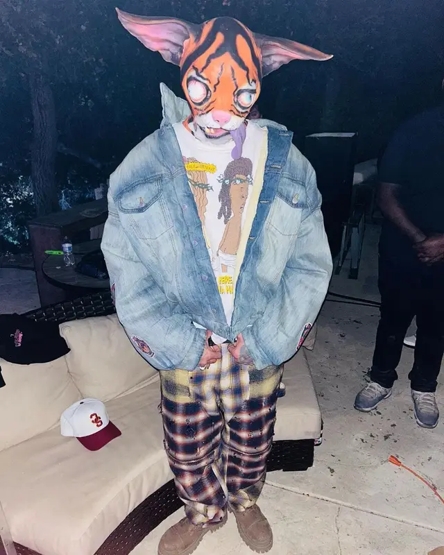 Chris Brown outfit in Saint Michael, Givenchy, and Balenciaga, 2023
