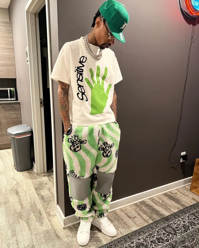 Sonny Digital outfit in Cartier, Fear of God, and New Era, 2022