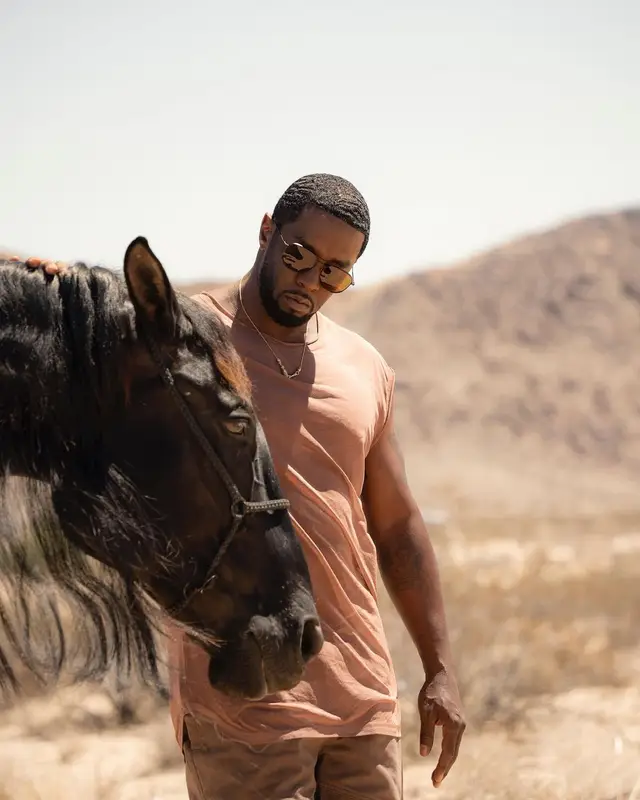 Diddy outfit in Saint Laurent, Rick Owens, and Prada, 2023