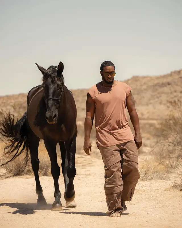 Diddy outfit in Saint Laurent, Rick Owens, and Prada, 2023