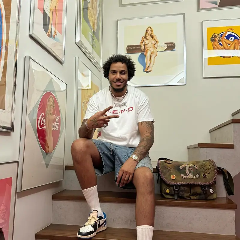 AJ Tracey outfit in Bape, Louis Vuitton, and Chanel, 2023