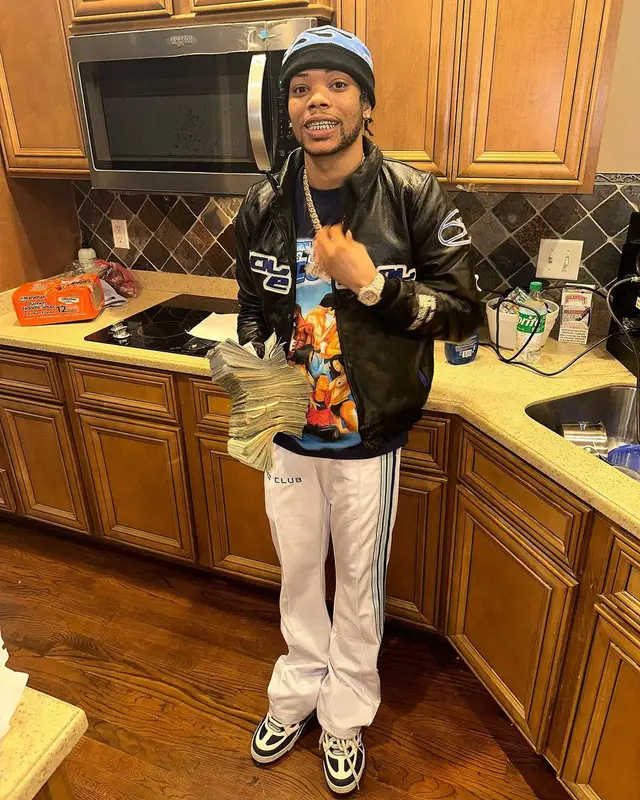 Lil Migo outfit in Sole et. Al, Louis Vuitton, and Deoz Club, 2023