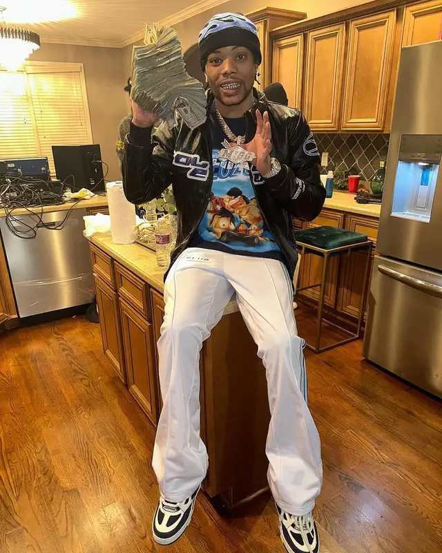 Lil Migo outfit in Sole et. Al, Louis Vuitton, and Deoz Club, 2023