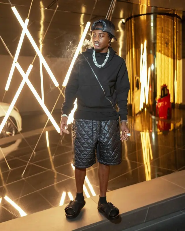 Lil Tjay outfit in Junya Watanabe, Maison Margiela, and Bottega Veneta, 2023