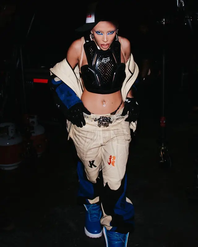 Doja Cat outfit in Kusikohc, B.B. Simon, and Fox Racing, 2023