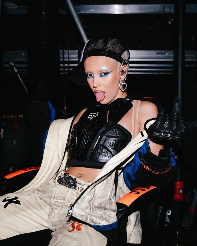 Doja Cat outfit in Kusikohc, B.B. Simon, and Fox Racing, 2023