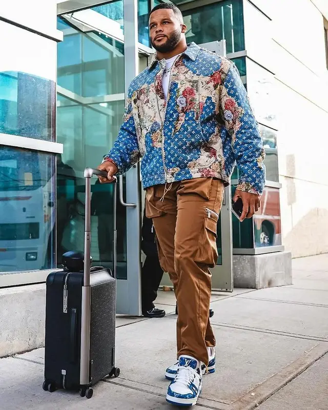 Aaron Donald outfit in Louis Vuitton and Rhude, 2023