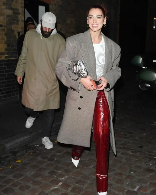 Dua Lipa outfit in GCDS, The Attico, and Gucci, 2023