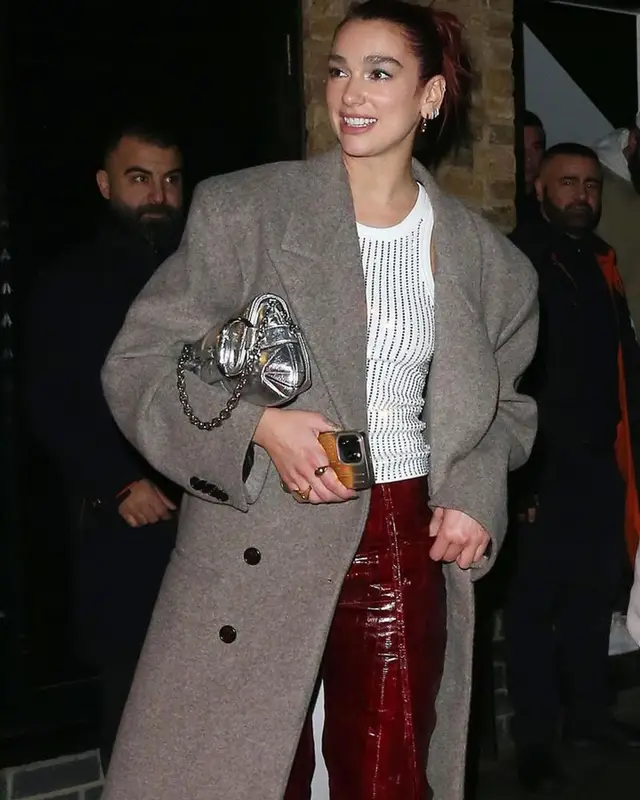 Dua Lipa outfit in GCDS, The Attico, and Gucci, 2023