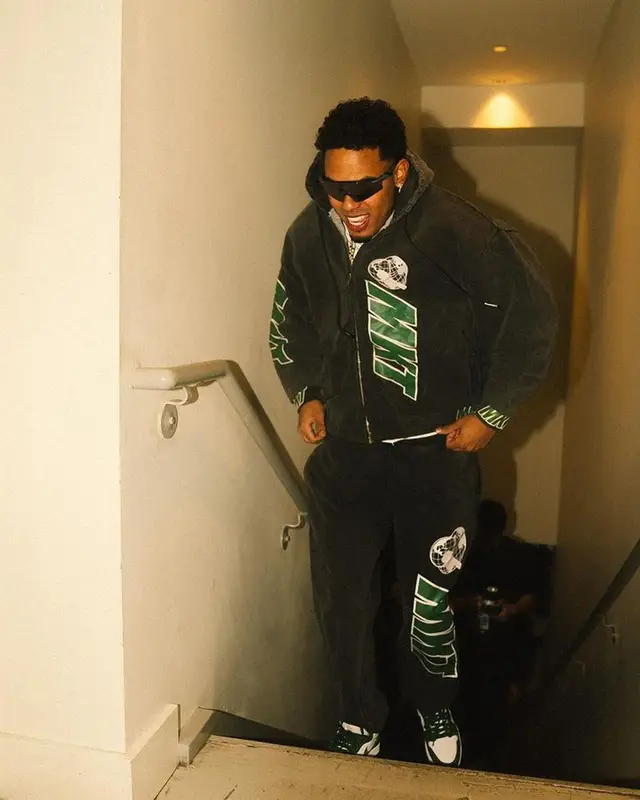 Myke Towers outfit in Market, Nike, and Oakley, 2023