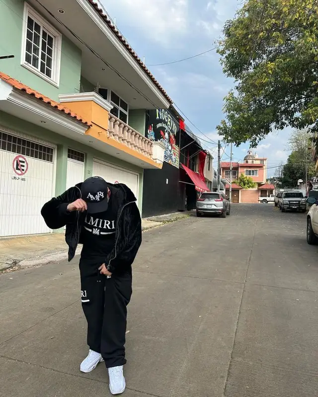 Jesus Ortiz Paz outfit in Nike, Louis Vuitton, and Amiri, 2023