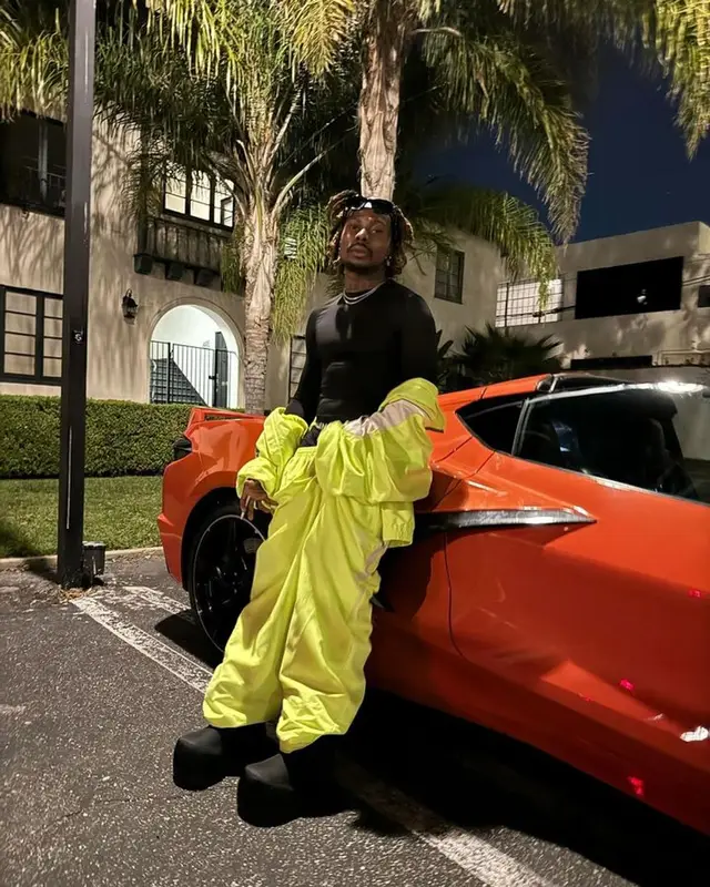 Asake outfit in Balenciaga, 2023