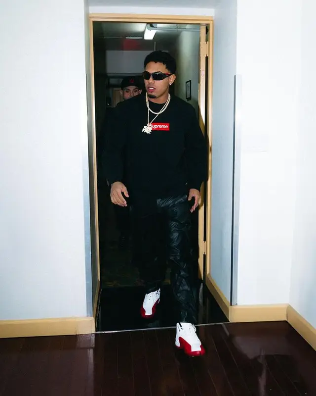 Myke Towers outfit in Supreme, Jordan, and Prada, 2023