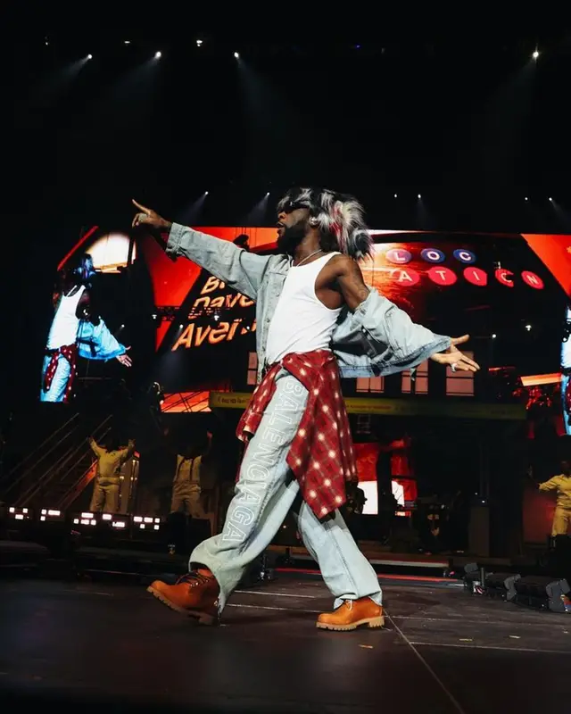 Burna Boy outfit in Balenciaga, Timberland, and Chrome Hearts, 2023